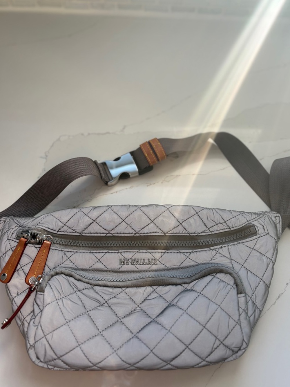 MZ Wallace small magnet sling crossbody bag
grey color
$75